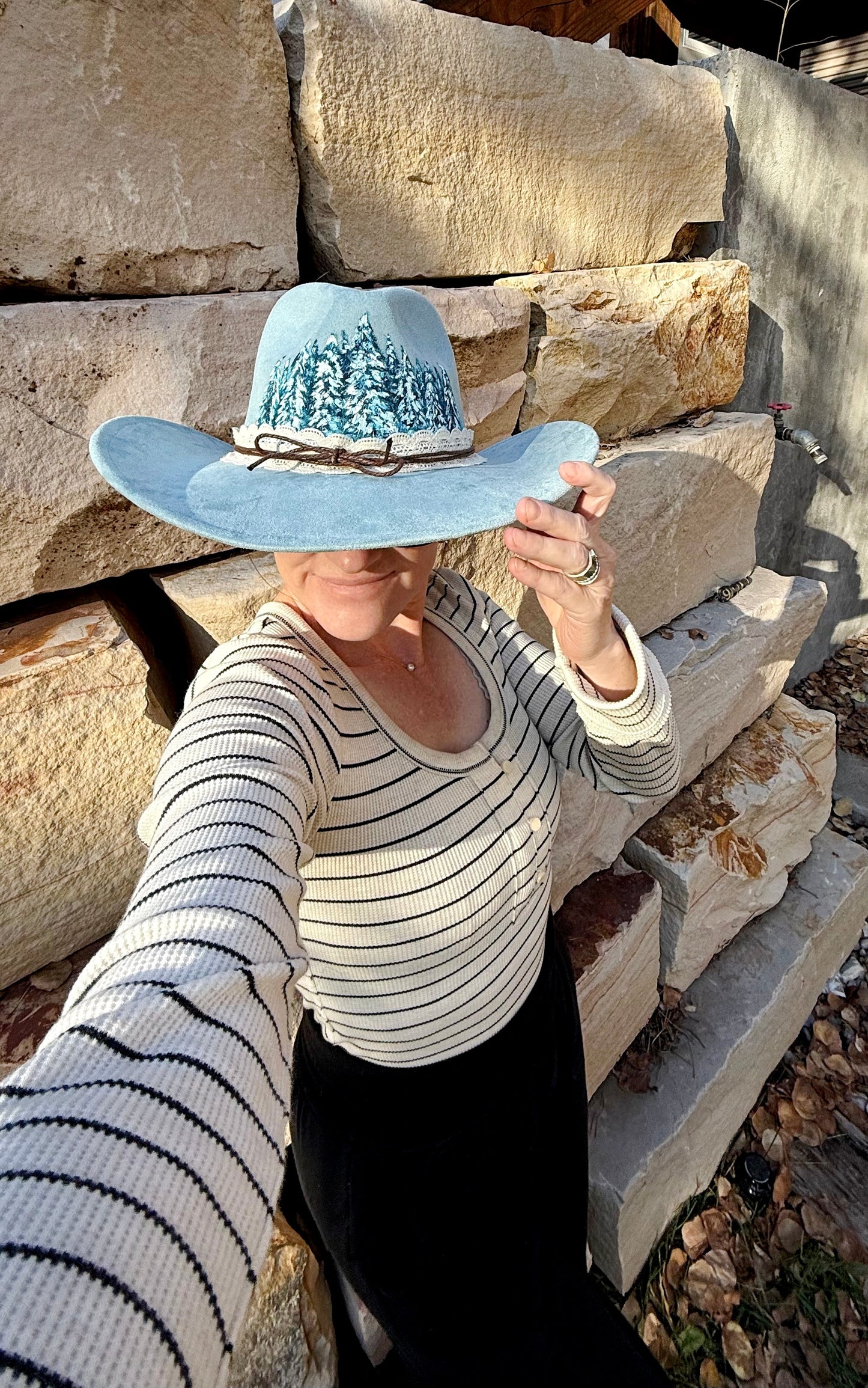 Elevate your style in this soft blue vegan suede hat - hand painted