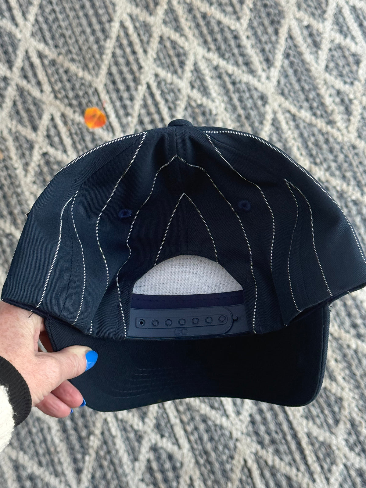 Hand painted wearable art that is washable- mountains scene on blue/white stripe ball cap