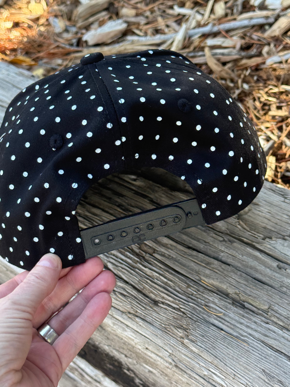 Hand painted flower on black and white polka dot canvas hat