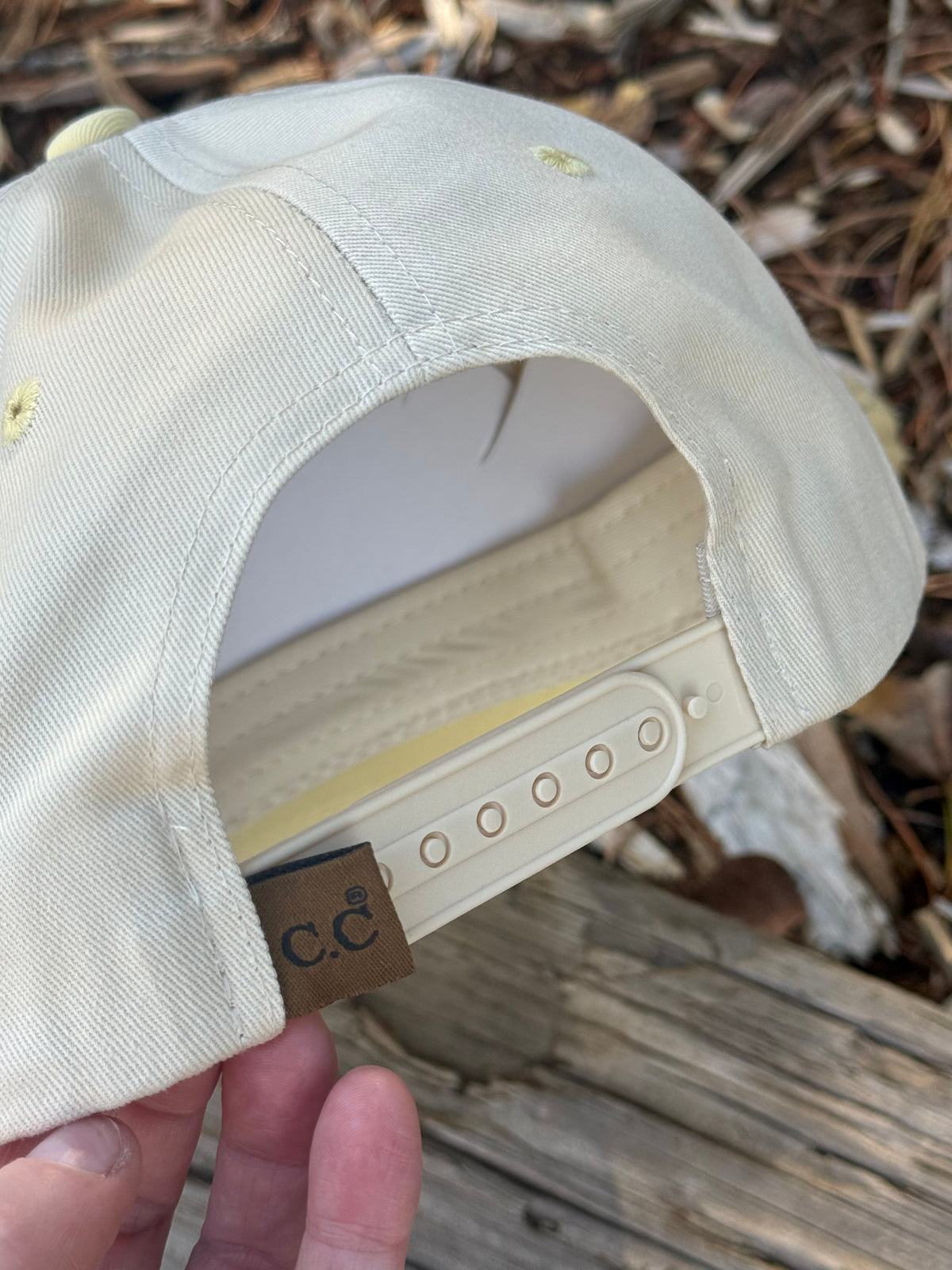 Hand painted bass fish on cream and yellow canvas hat