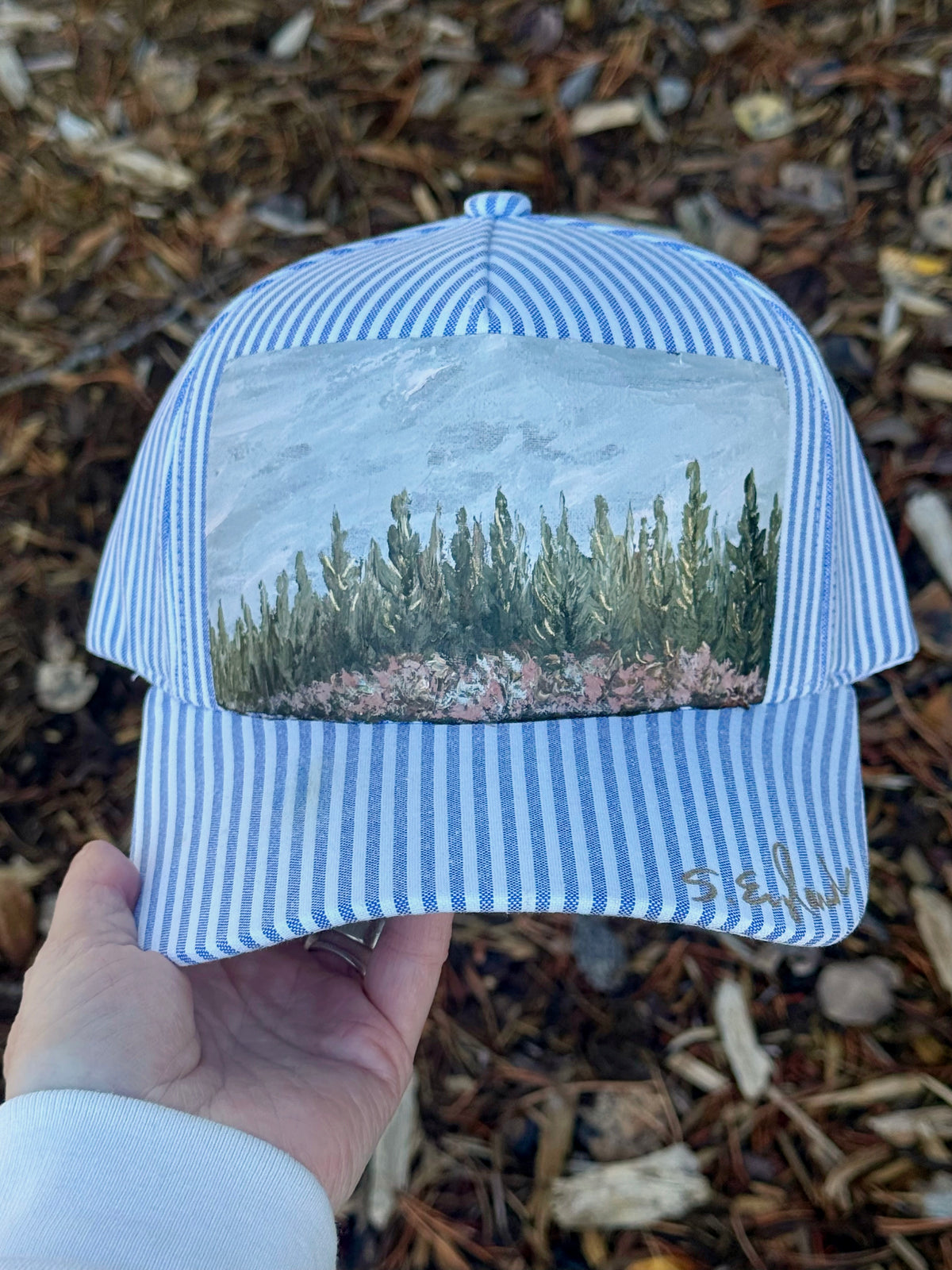 Hand painted wearable art on white and blue stripped baseball cap - tree scape