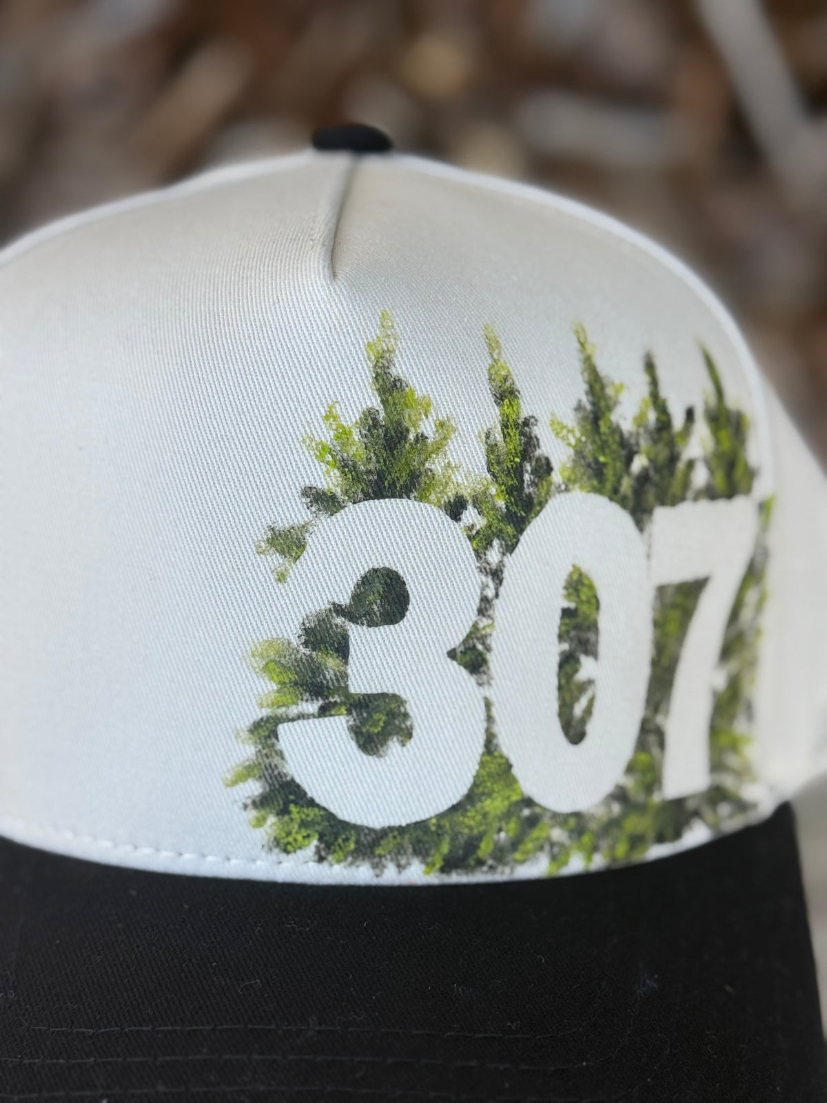 Hand painted wearable art painted on cream/black canvas ball cap - Wyoming vibes