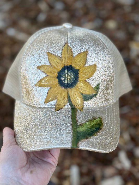 Wearable art painted on gold sparkle baseball cap - sunflower