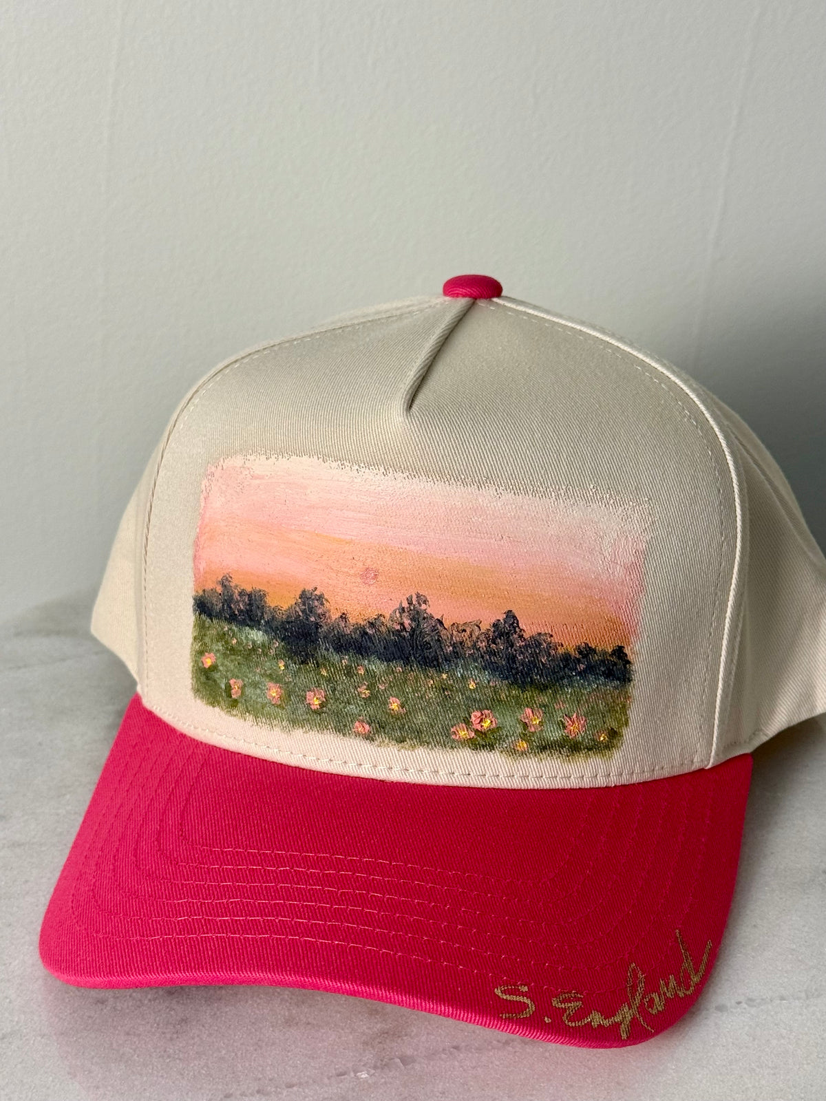 Hand painted wearable art on pink brim and tan baseball hat - pink sunset landscape