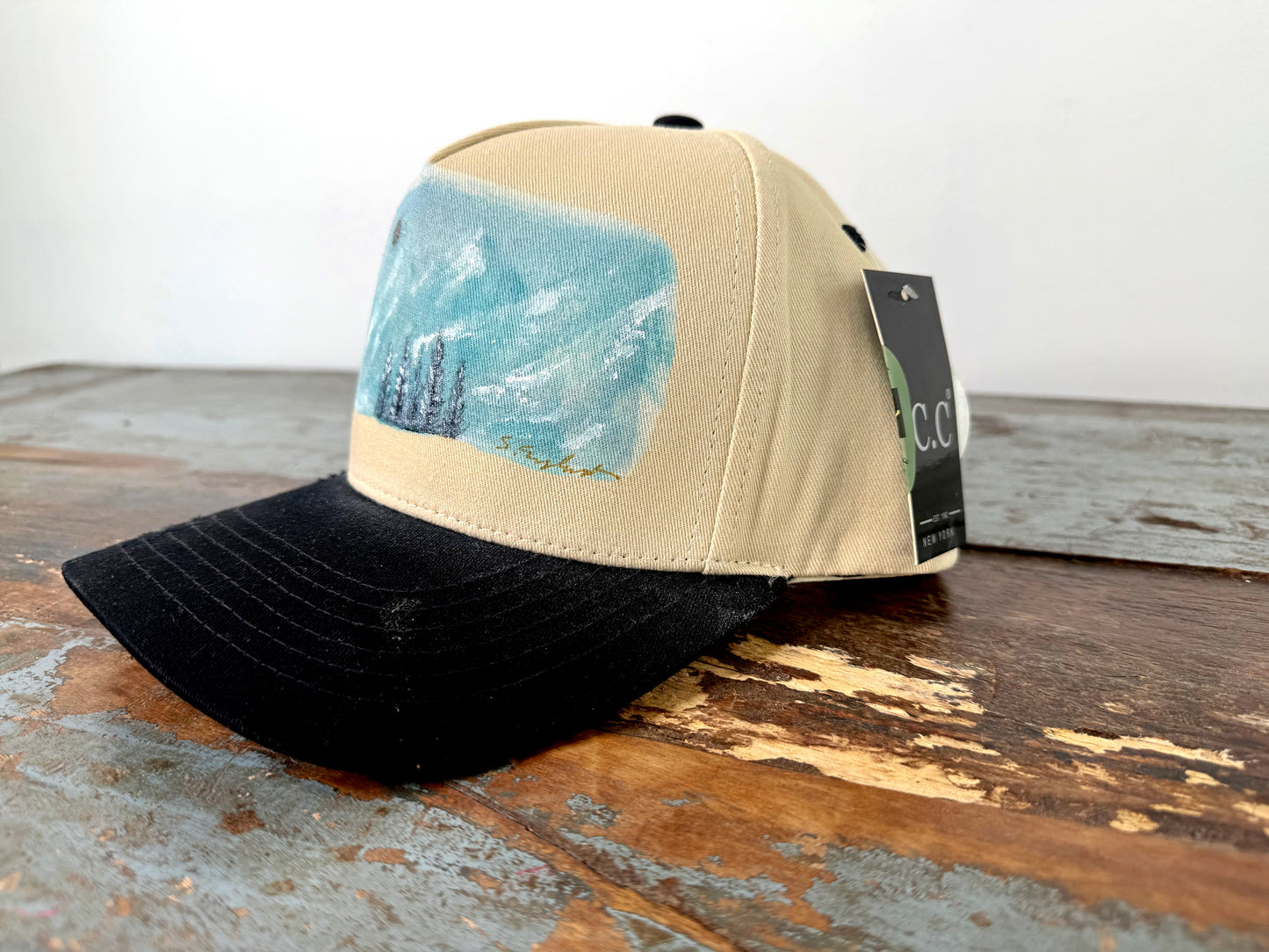 Wearable art - go to the mountains trucker hat