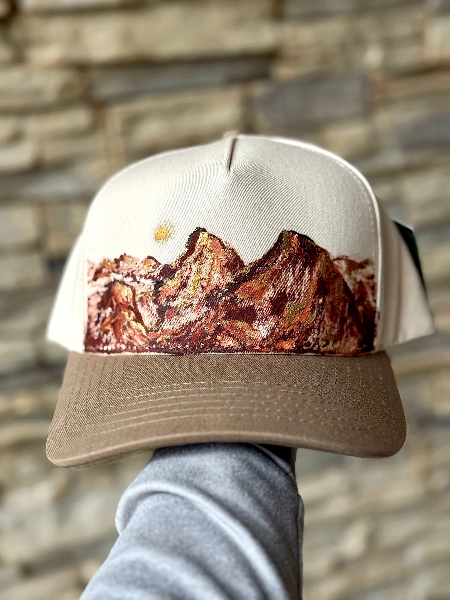 what are men to rocks and mountain hand painted canvas  CC trucker hat - cream and light brown