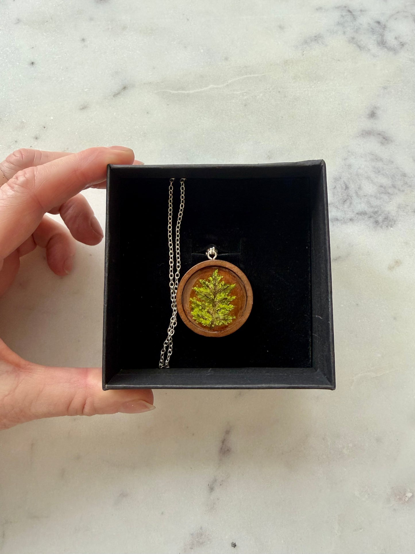 Hand painted pine tree on wood disc necklace