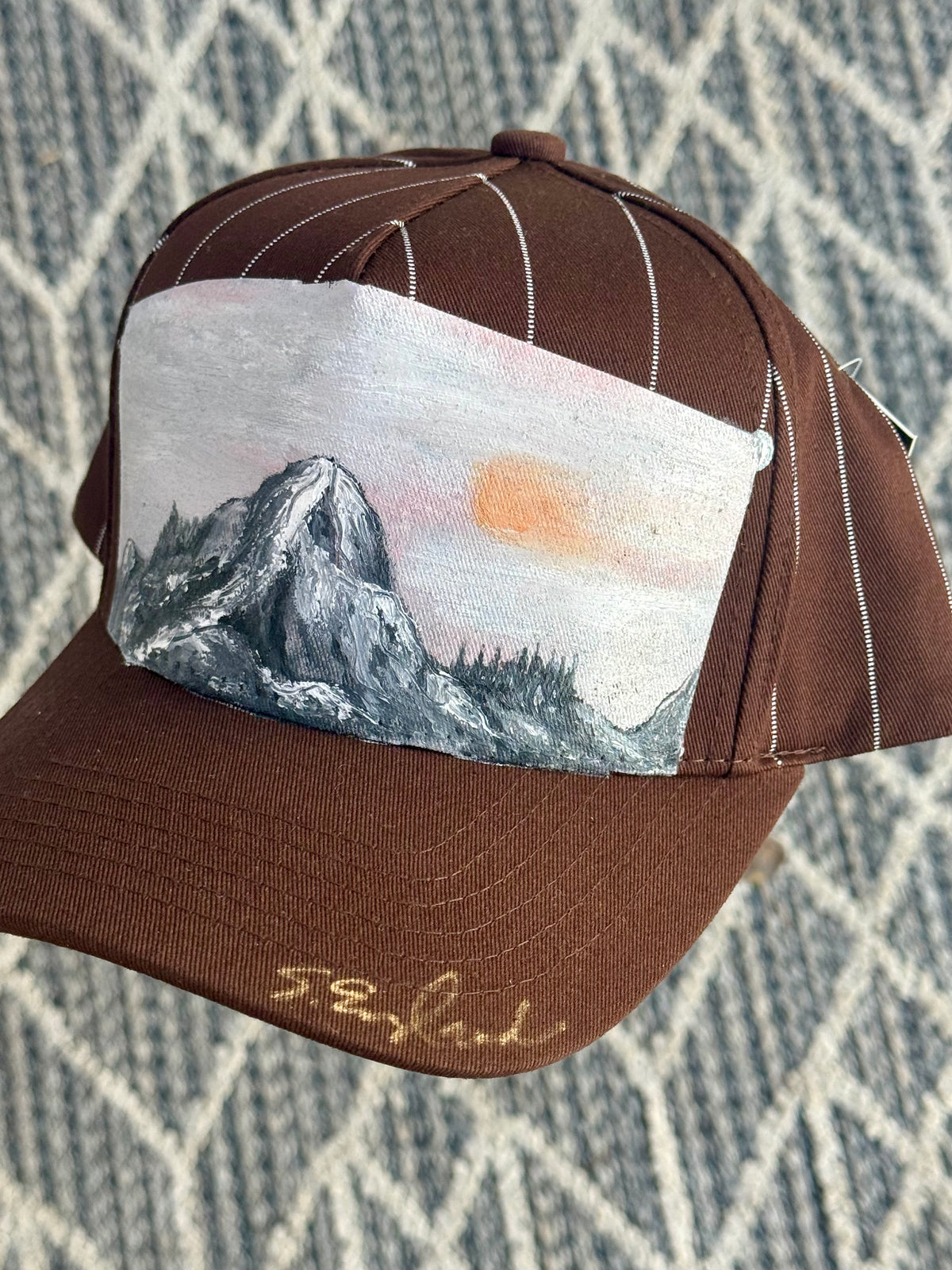 Hand painted wearable art - big mountain scene on brown/cream baseball cap