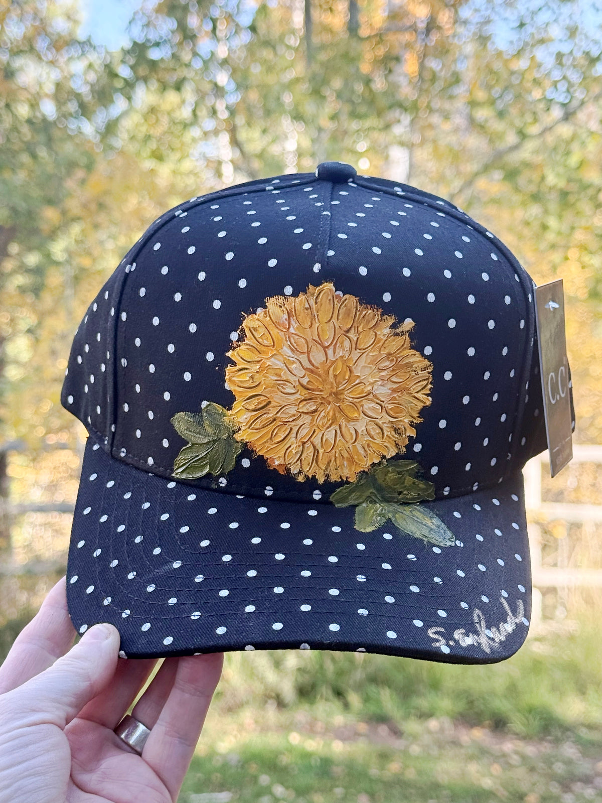 Hand painted flower on black and white polka dot canvas hat