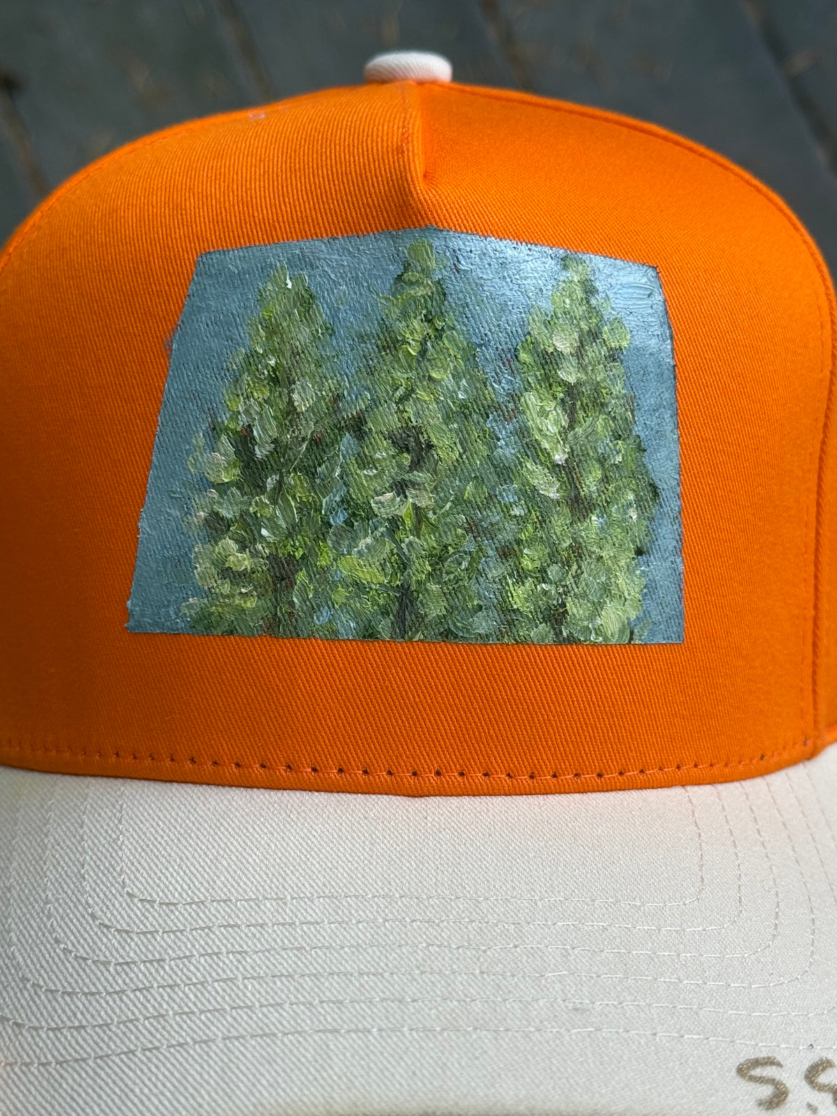 Hand painted tree scene on cream and orange canvas hat