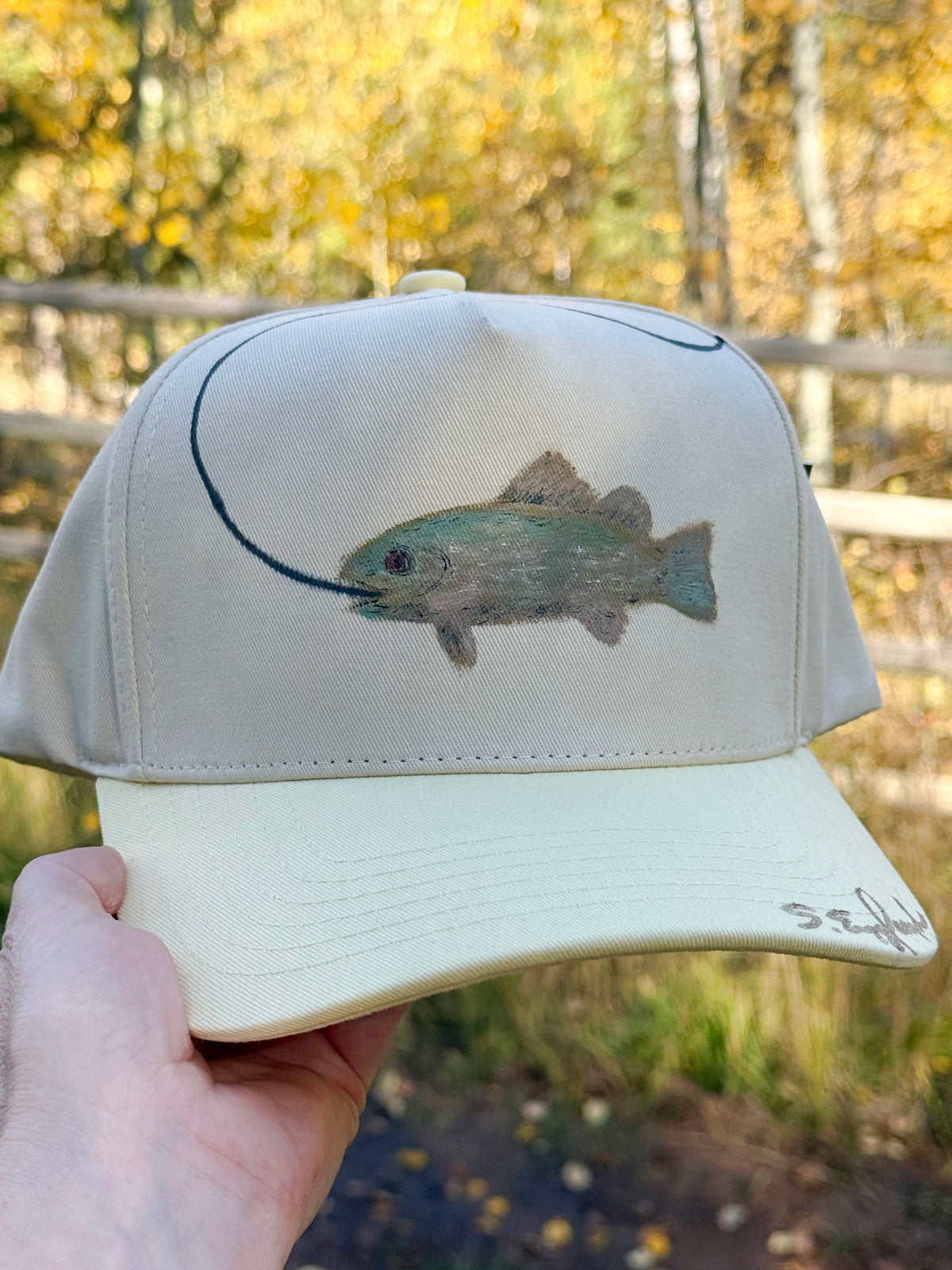 Hand painted bass fish on cream and yellow canvas hat