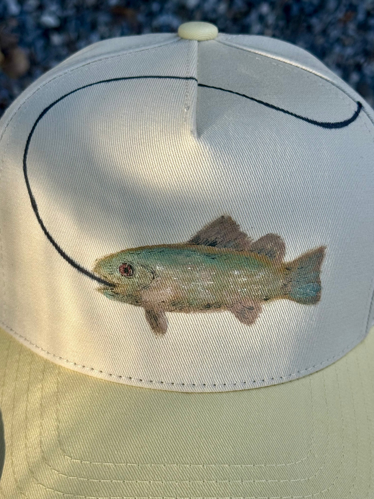 Hand painted bass fish on cream and yellow canvas hat