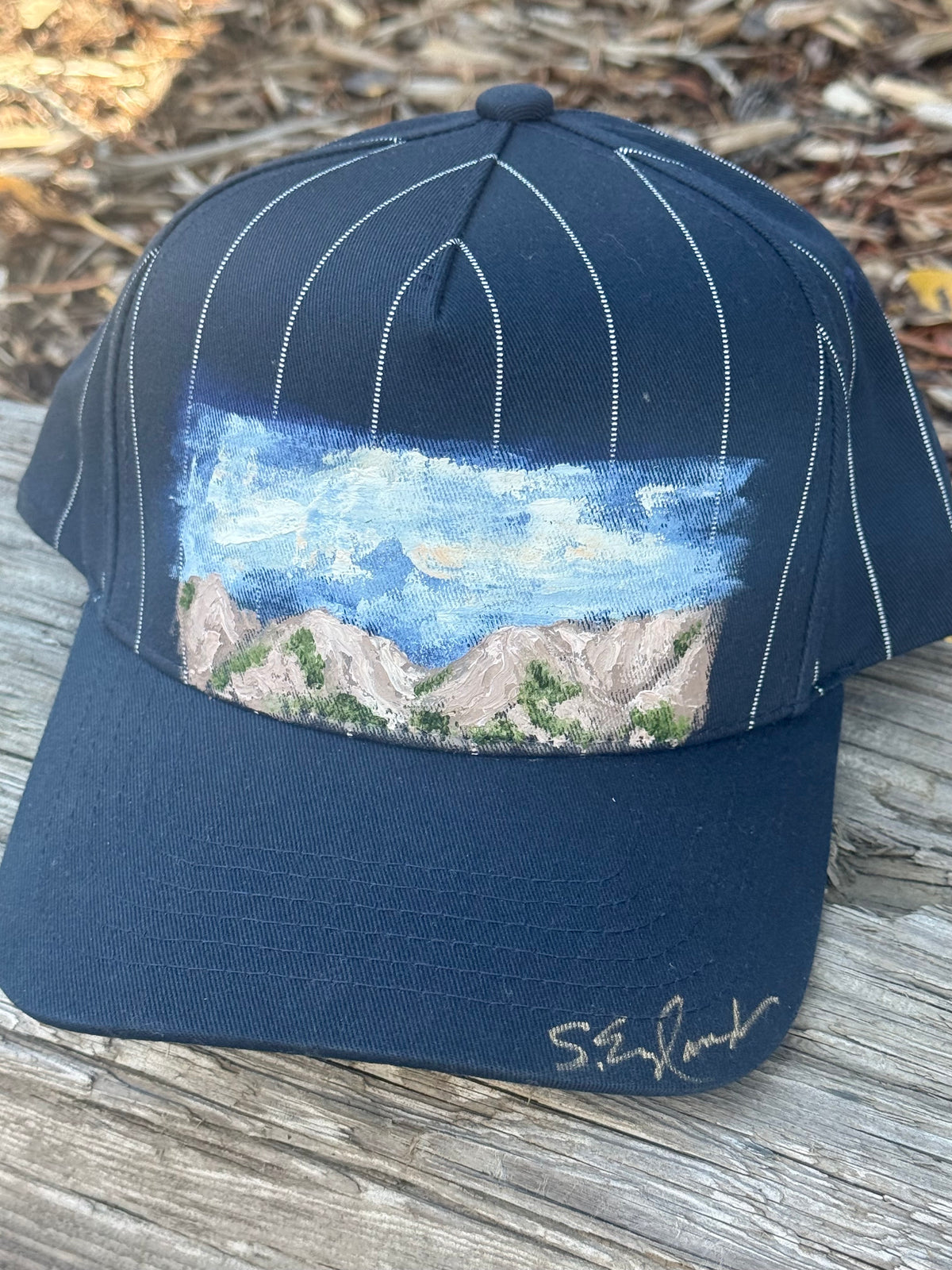 Blue and white striped canvas hat - mountain scene