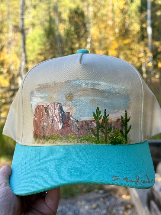 Hand painted desert landscape painted on cream/teal baseball cap