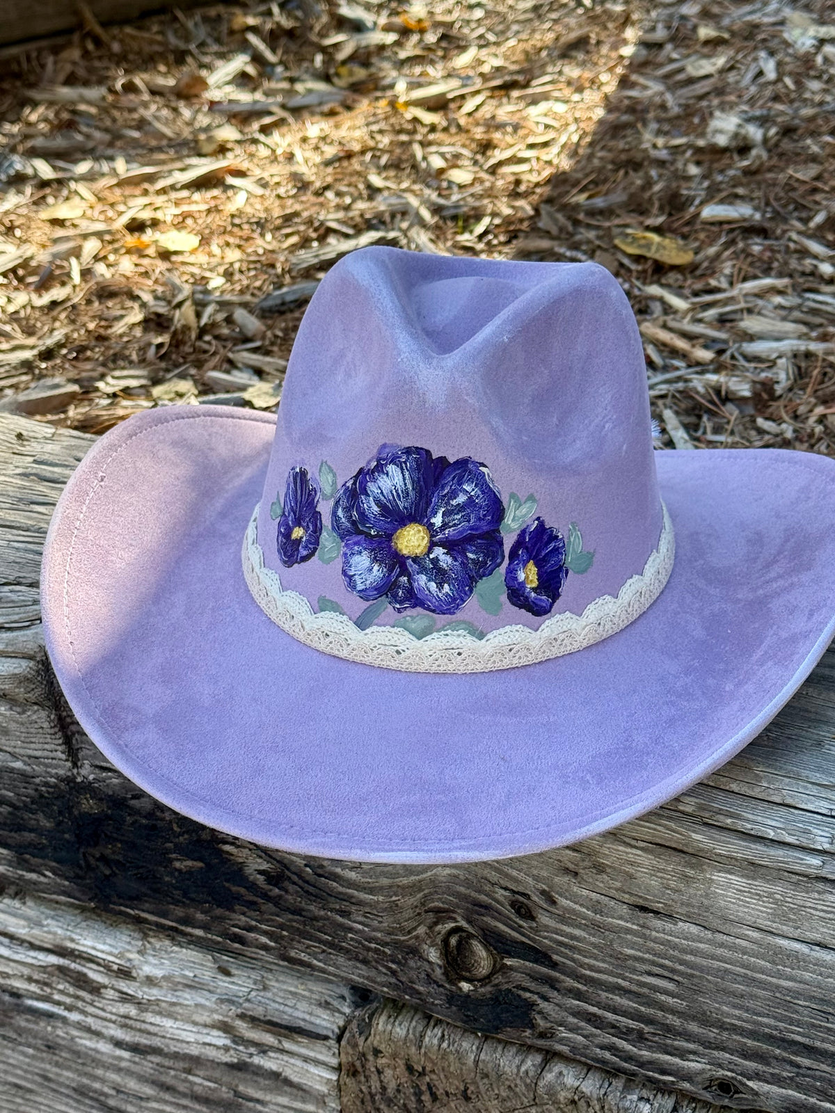Hand painted on purple vegan suede cowgirl/boy hat - purple pansies
