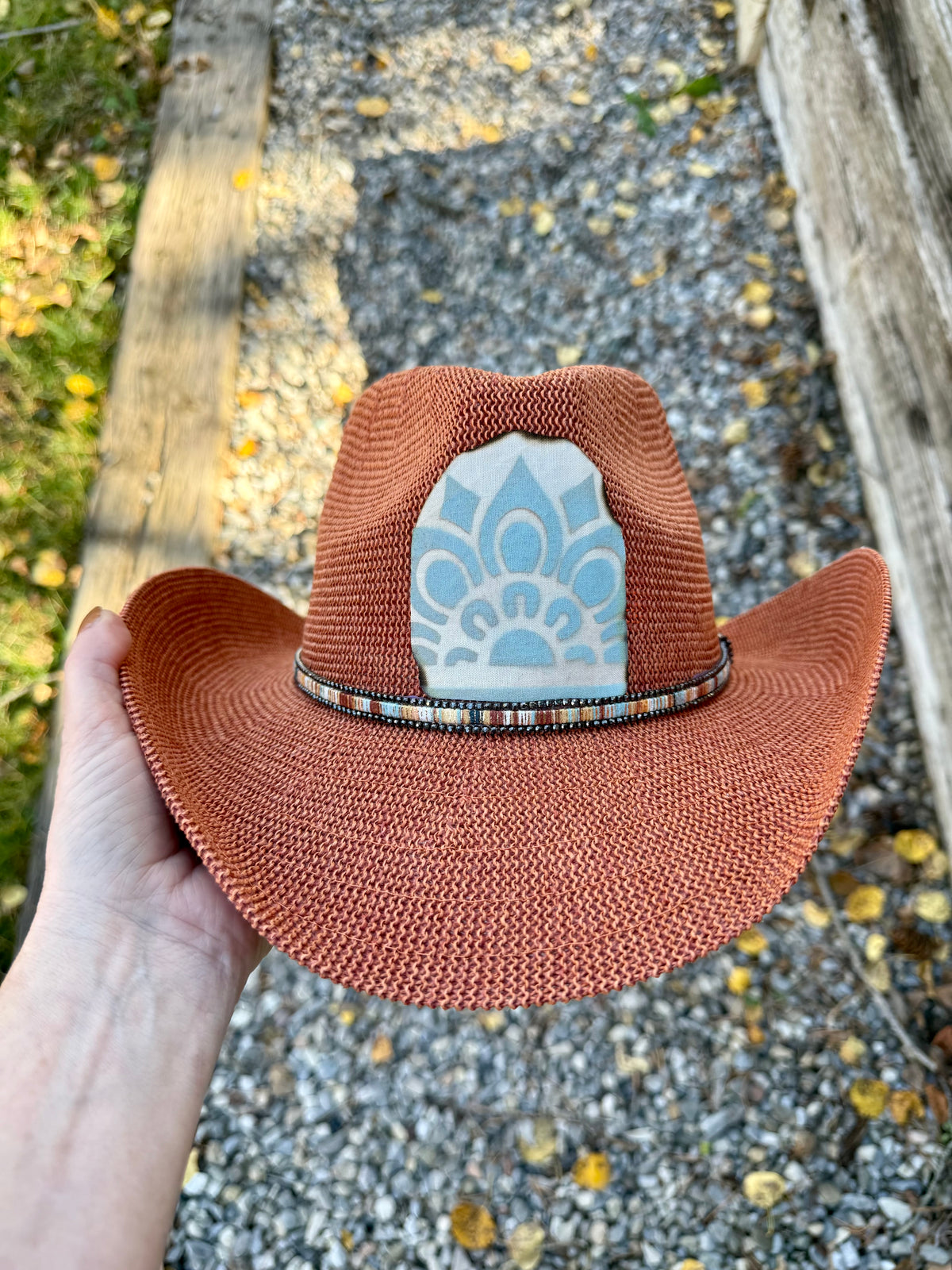 Hand painted orange sunhat style cowgirl/boy hat - spray paint design