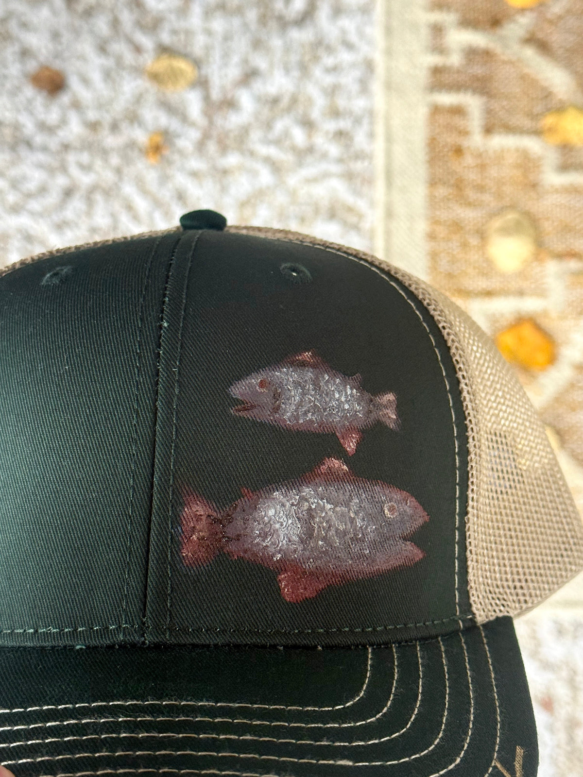 Wearable art!  Hand painted on green canvas baseball hat - two fish